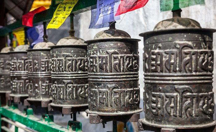 Prayer wheels with Sanskrit text
